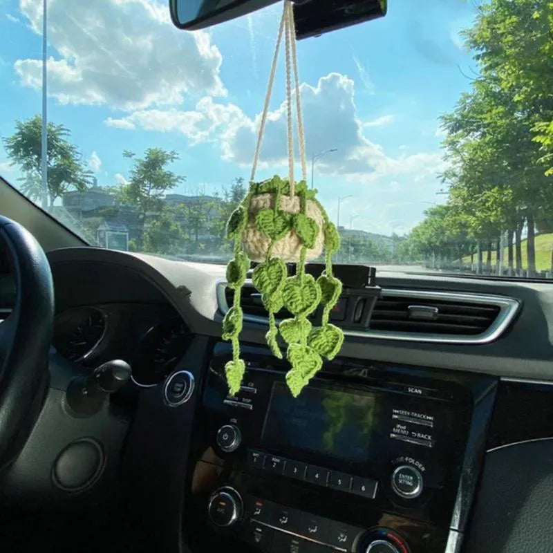 Green and white knitted wool car plant decoration with basin base and hanging rope