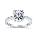 925 sterling silver engagement ring with 7.5mm main stone and small stones on white background