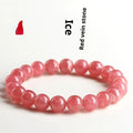 Women's geometric red rhodochrosite crystal bracelet with a longevity lock on a white background.