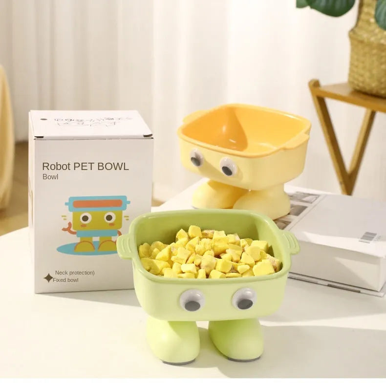 Green robot-shaped elevated cat bowl with tilted design and detachable inner section