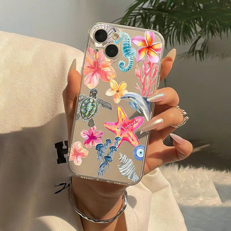 Transparent iPhone case with dolphin turtle design showing through clear TPU material