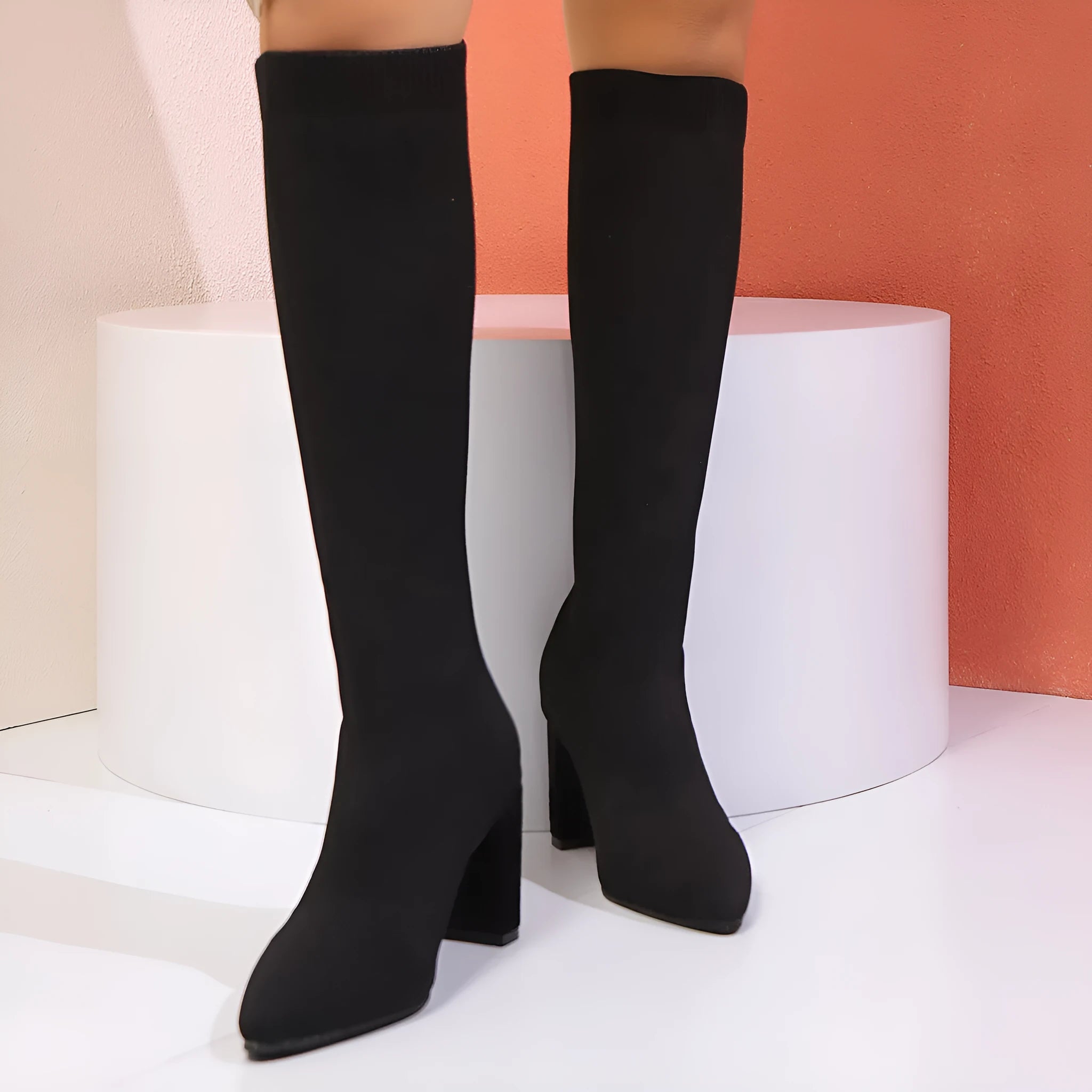 Black high heel fashion boots for women with fabric upper and high shaft
