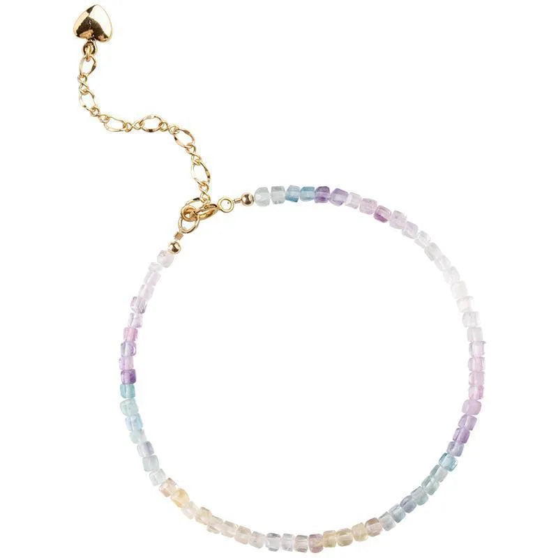 Handmade women's bracelet with geometric copper links and rainbow fluorite decoration