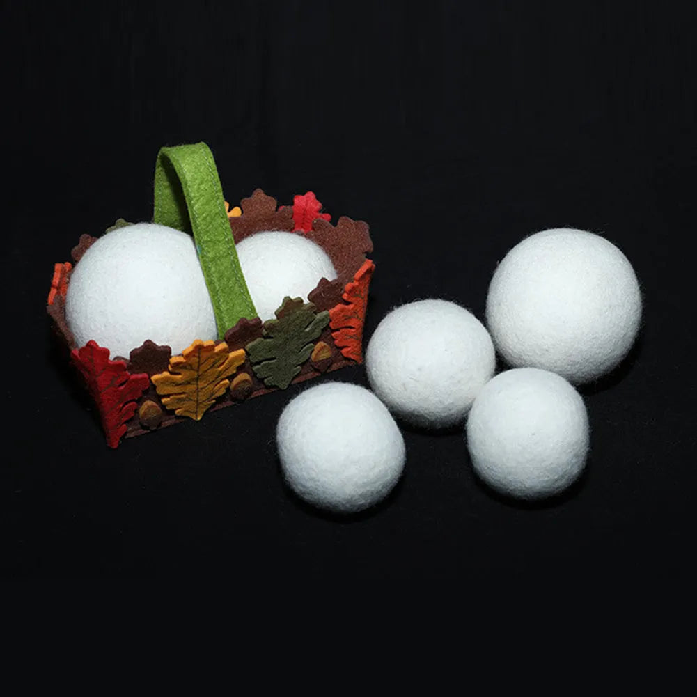 Set of natural wool drying balls with cotton storage bag for laundry static reduction