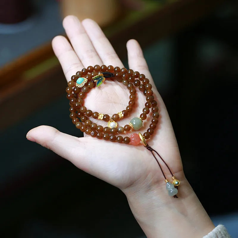 Brown jade Hetian jade three-ring bracelet with butterfly gourd pearl design and silver accessories