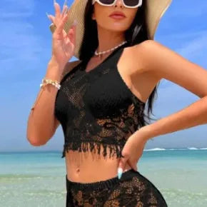 Women's white two-piece bikini swimsuit with lace briefs and matching tassel skirt beach cover-up