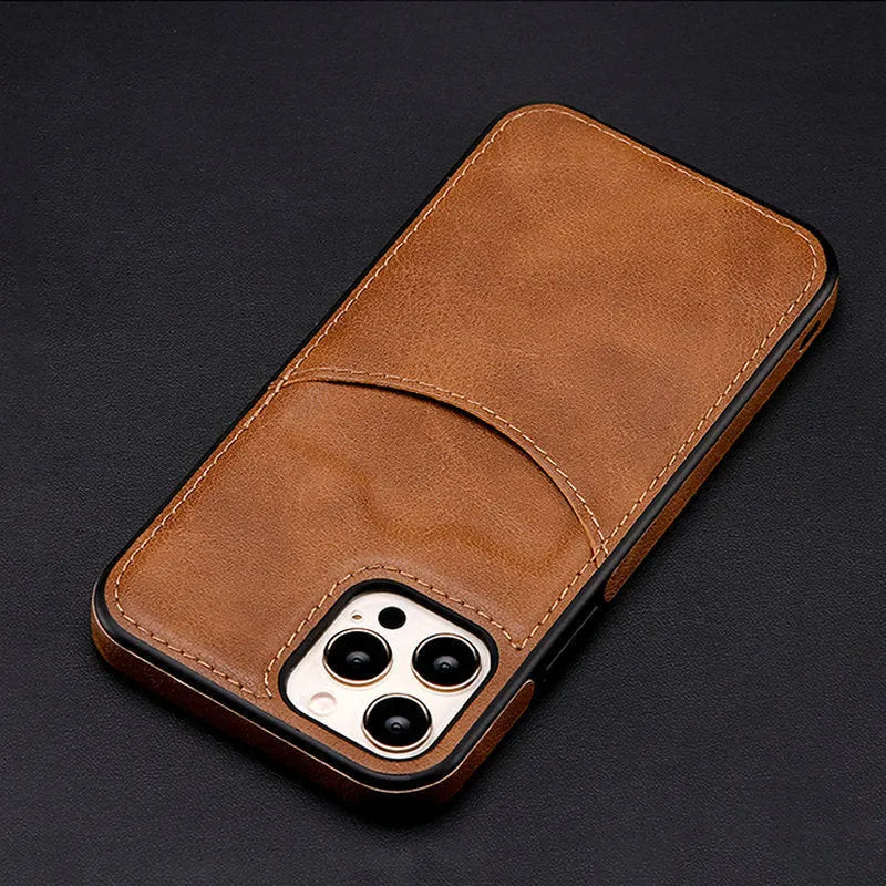 Dark blue PU leather snap-on case for iPhone showing precise cutouts for camera and ports.