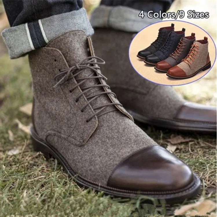 Men's black leather ankle boots with silver buckle strap on side, featuring a thick rubber sole.