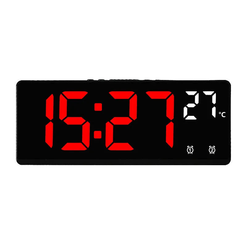 Large screen electronic LED alarm clock showing time and temperature, in a black acrylic casing.