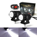 Aluminium and PC dual-lens motorcycle spotlight with white or yellow light, dimensions 6cm x 6cm x 7cm.
