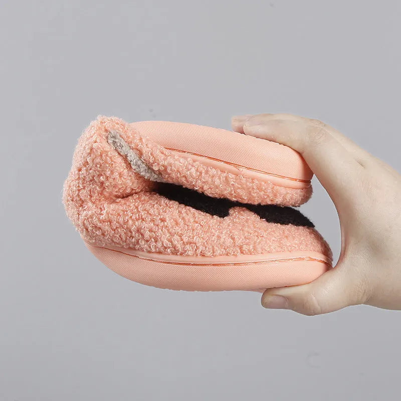 Halloween pumpkin cartoon thermal winter cotton slippers with suede upper, non-slip TPR sole, available in black and watermelon red