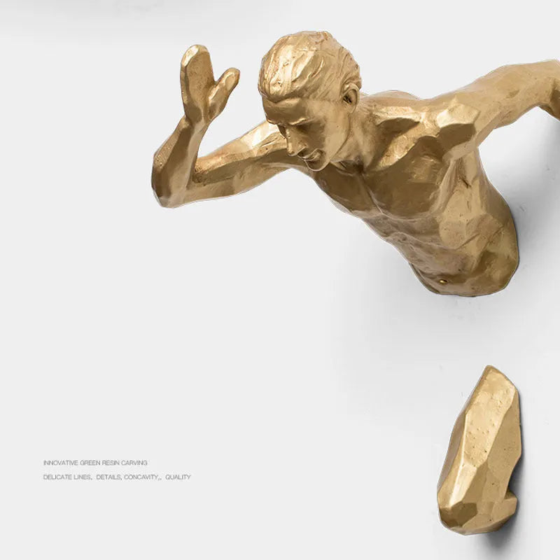 A modern, simple-style resin character sculpture for wall decoration, shown in a metallic finish.