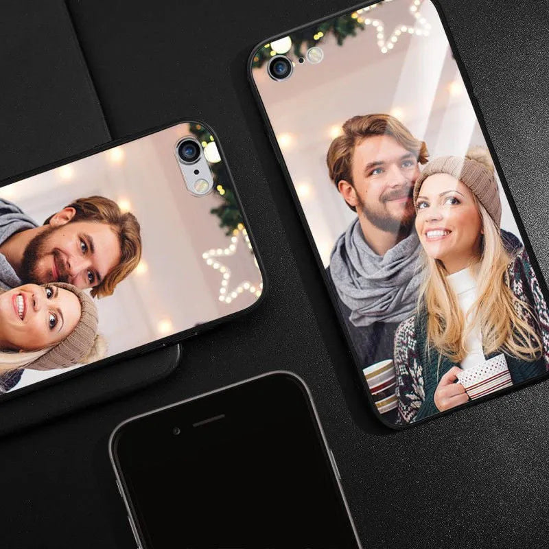 Slim patterned protective case for Apple iPhone with raised edges around screen and camera.