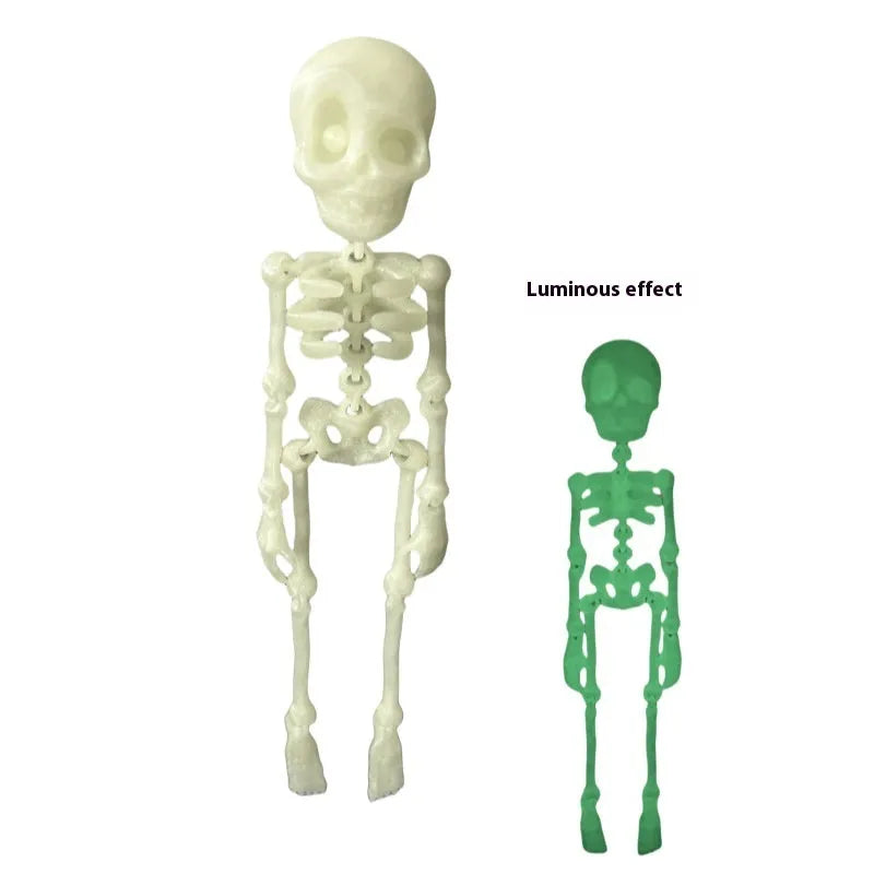 3D printed white skull Halloween fridge magnet on a metal surface showing detailed design.