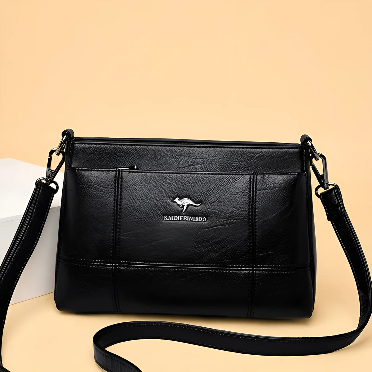 Small square sheepskin shoulder messenger bag with soft handle and double strap in solid colour