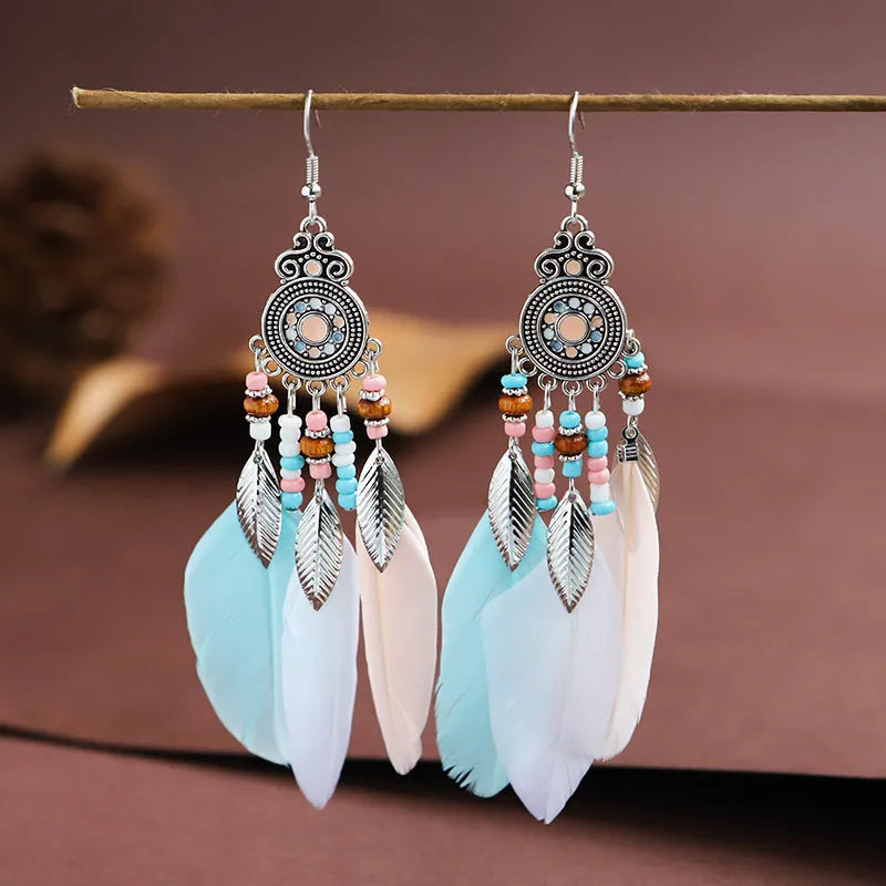 Bohemian style round drop feather earrings with leaf design in alloy, showing electroplated finish.