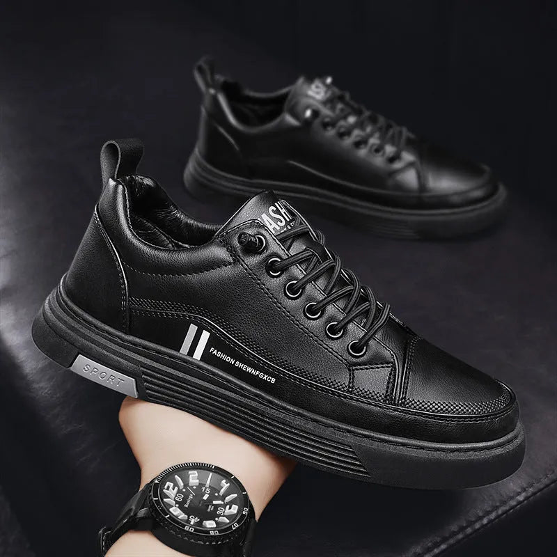 Men's white and black low-top skateboard shoes with an elastic band closure and round toe.