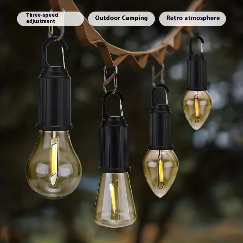 Five solar-powered lantern-shaped outdoor lights with warm white LED illumination