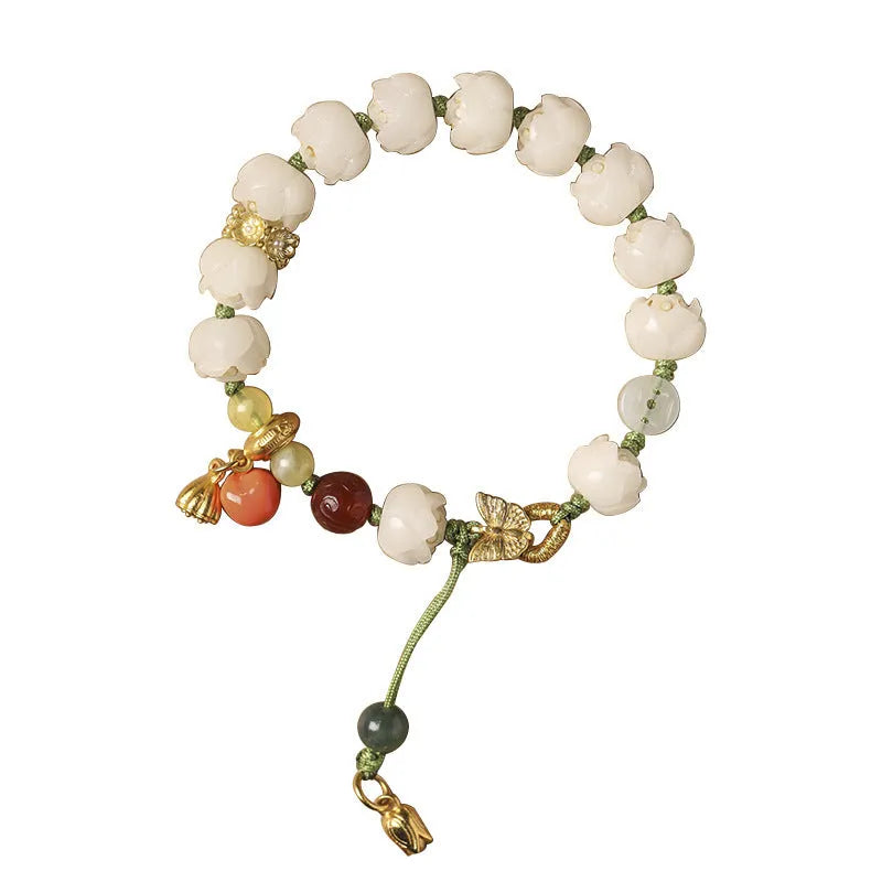 White jade bodhi bracelet with lotus and pumpkin beads on open rope