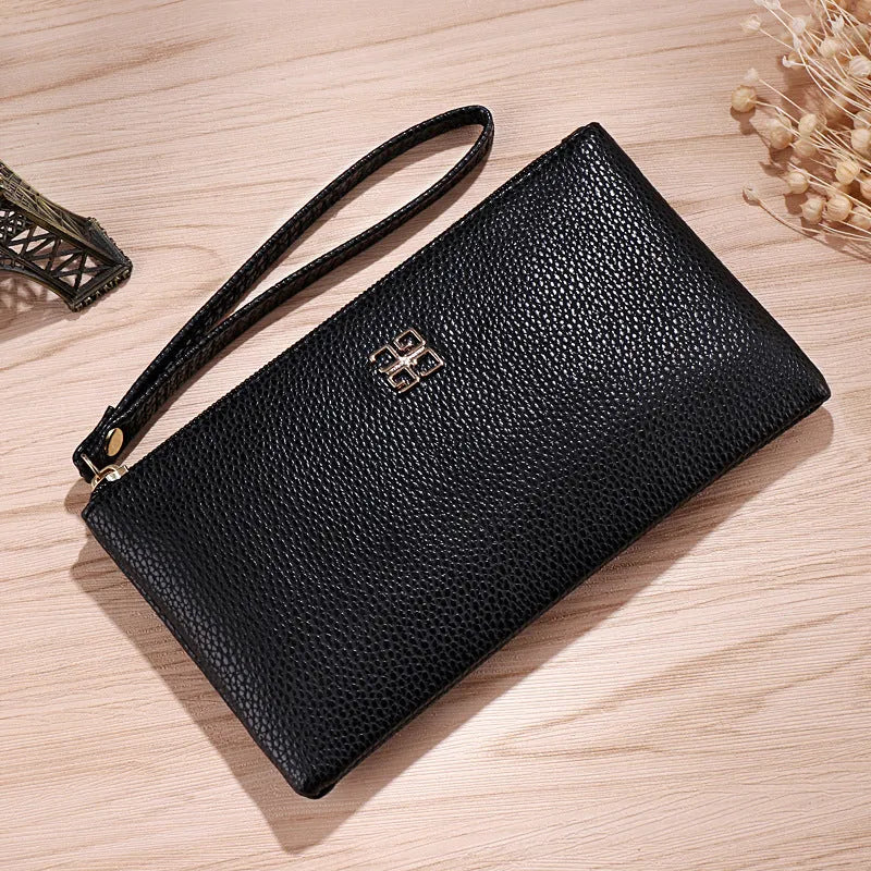 Long wine red PU leather wallet handbag with a zipper and visible sewing lines, laid flat to show its 55-inch length.