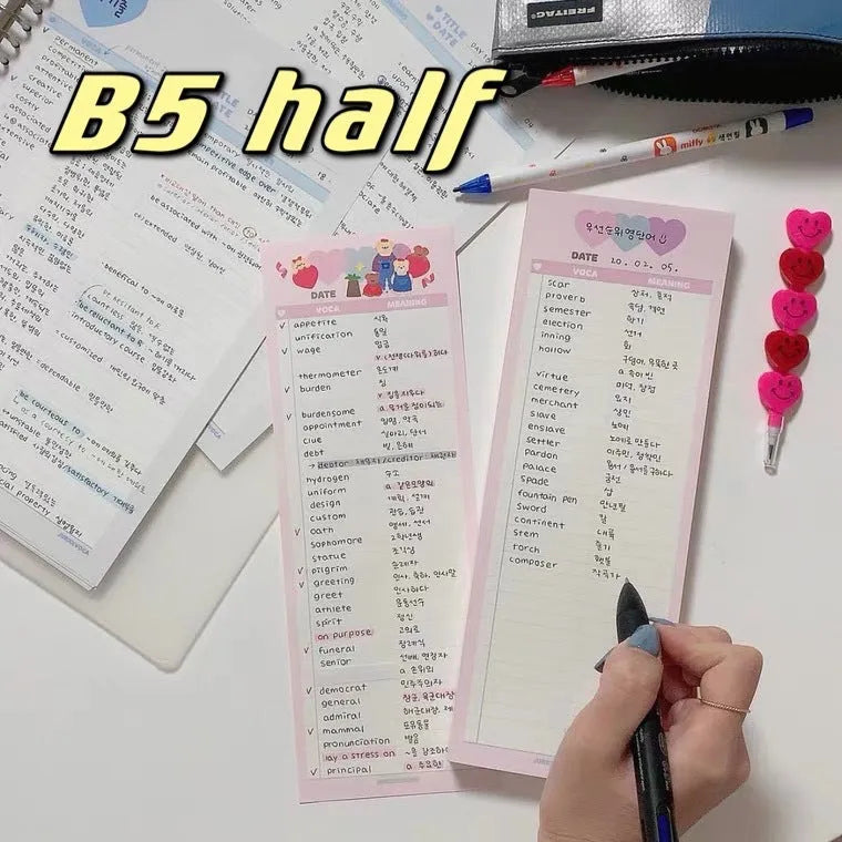 Vertical B5 half-size notepad with English words printed on paper, shown in pink, purple, and blue cover colours.