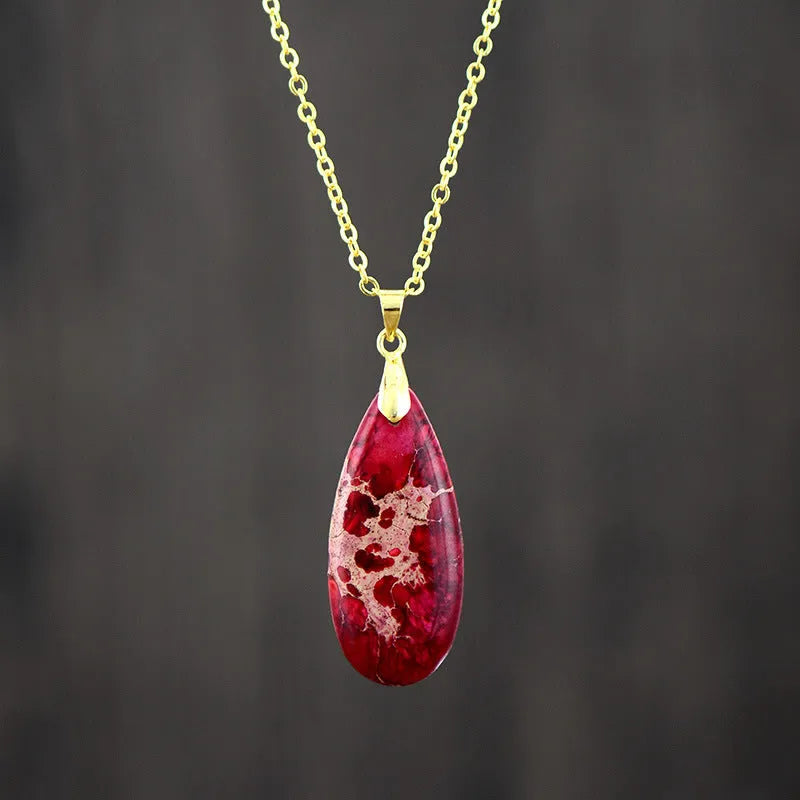 Genuine jade water drop pendant necklace with 18K gold plating in four colour options on a metal chain.