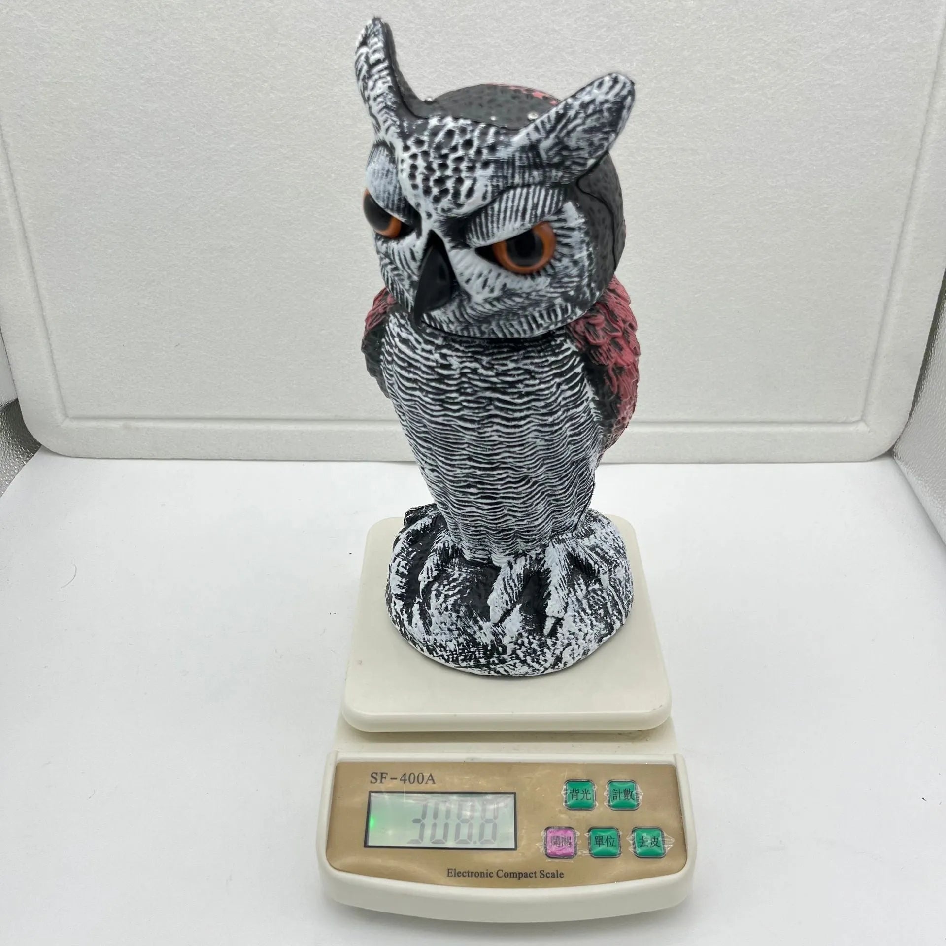 Artificial owl bait ornament with shaking head, made from white PE plastic, showing round ear design.