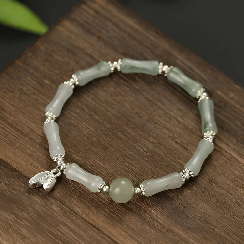 Women's antique style bracelet made from Tianshan green bamboo and sterling silver with bamboo joint detailing