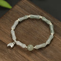 Women's antique style bracelet made from Tianshan green bamboo and sterling silver with bamboo joint detailing