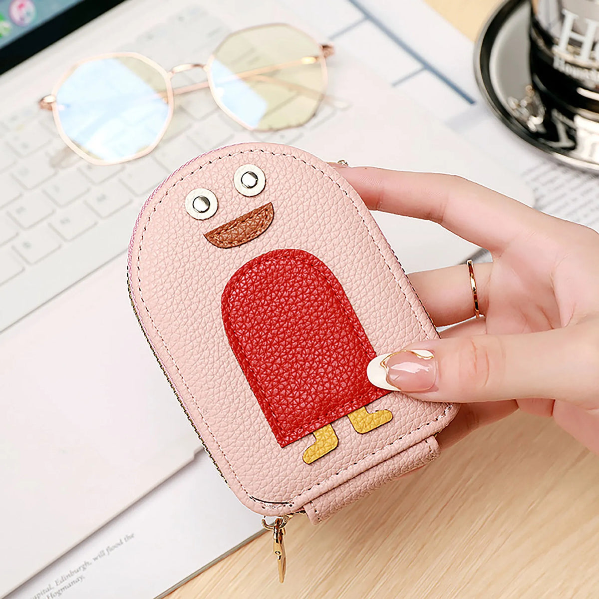 Lychee pattern penguin expanding card holder in black PU leather with rivet details 12x7.5x3cm