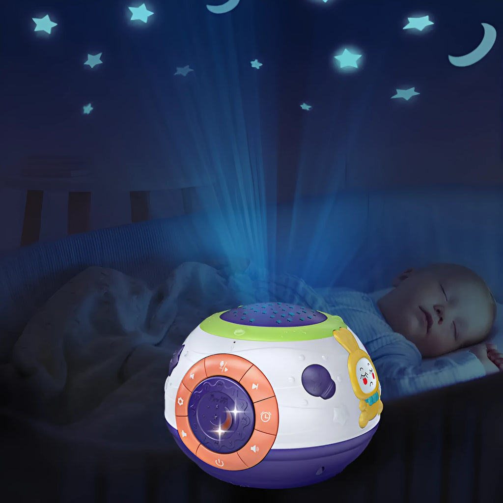 White plastic starry sky night light projector for children on a table, projecting blue stars onto a wall.