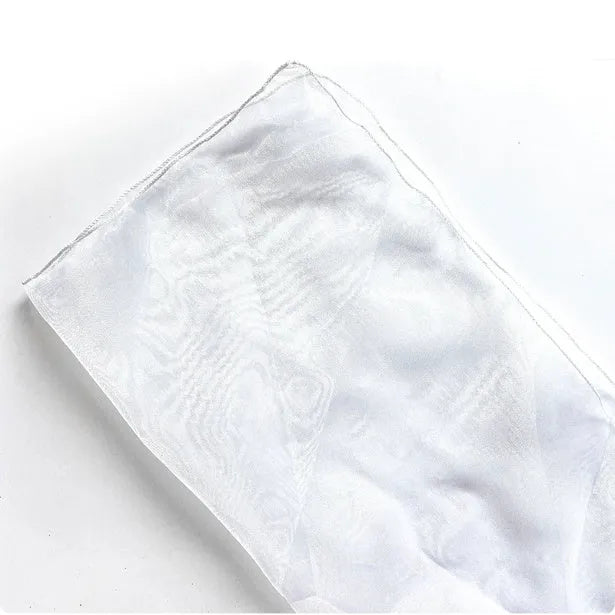 Two square pieces of Arabesquitic silk fabric for wrapping flower bouquets, shown in assorted colours.