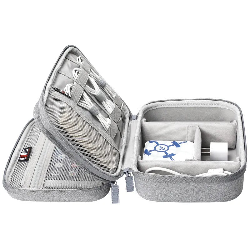 Black EVA digital storage bag with a handbag shape for organising headphones and cables.