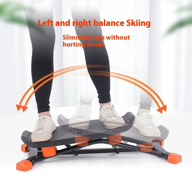 Black mini fitness skiing machine for home indoor cardio workouts.
