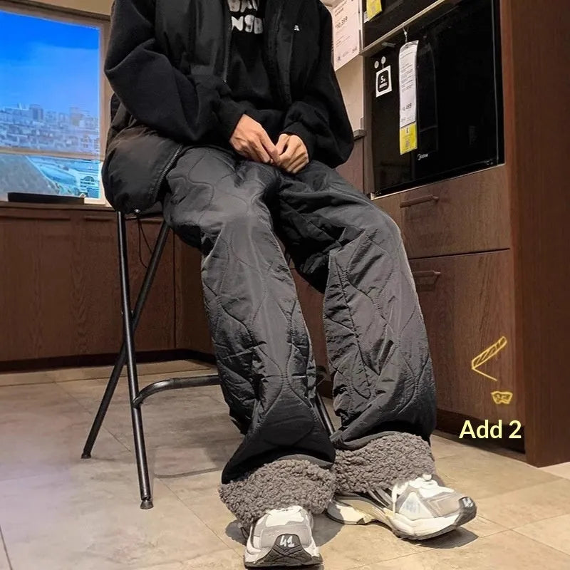 Men's fleece-lined down pants in black with drawstring waist and belt for cold weather warmth