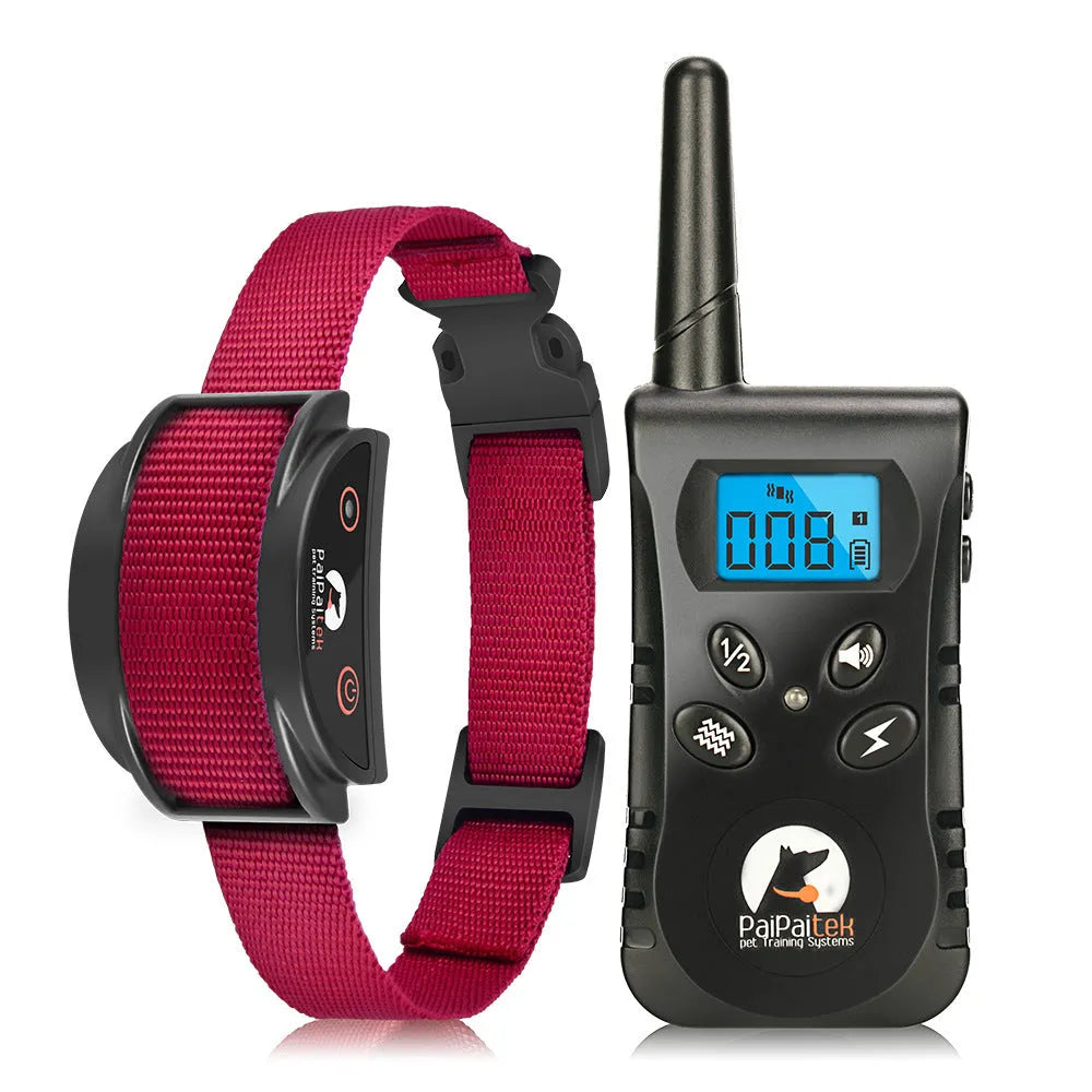 Red remote control dog trainer with bark arrester, nylon collar strap, and USB charging cable on white background