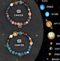 Two natural stone beaded bracelets with adjustable knots on a wooden surface, showing zodiac charm detail.
