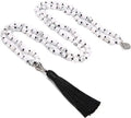 Handmade long necklace with 108 knotted 8mm natural stone beads in geometric shapes.