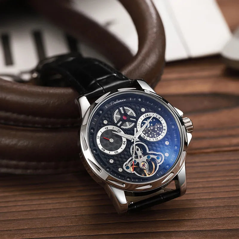 Automatic men's business watch with luminous hands on a steel bracelet.