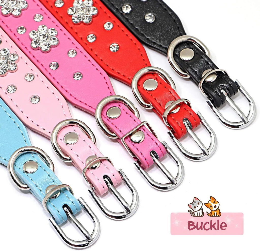 A black PU leather dog collar with glittering rhinestone flower studs and a metal D-ring.