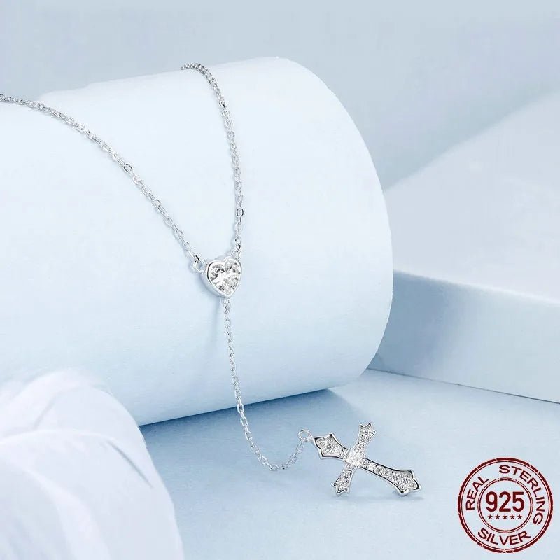 Silver love cross necklace with V-shaped pendant on an O-ring chain, colour BSN384.