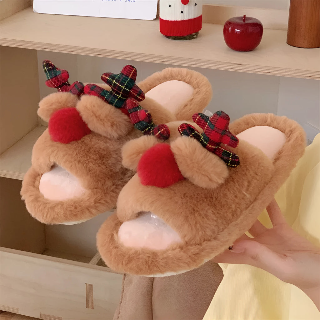 Brown women's slippers with a cartoon deer design, suede upper, and PVC sole.