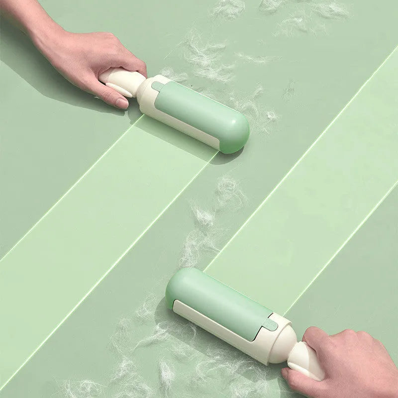 White green pet hair remover roller with self-cleaning base and non-slip handle on a carpet.