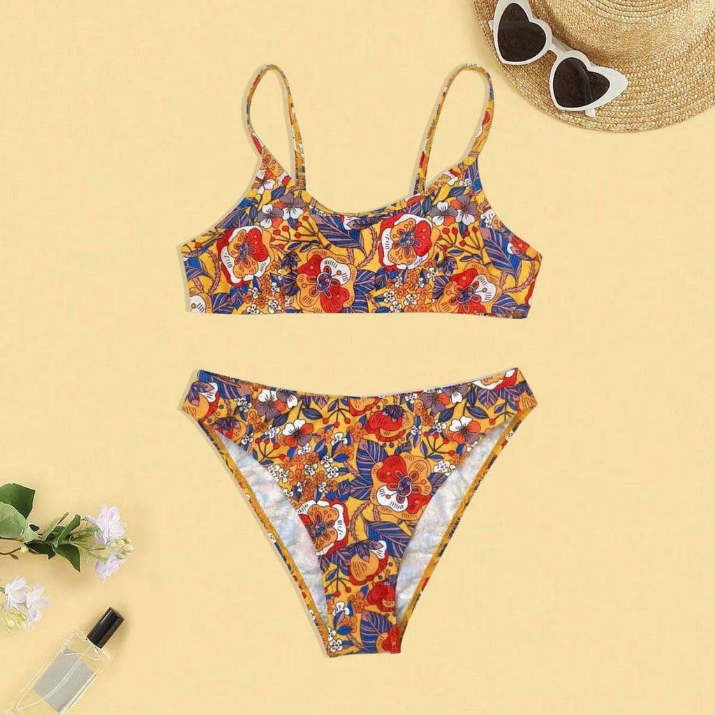 Plus size floral print women's bikini swimsuit with adjustable straps.
