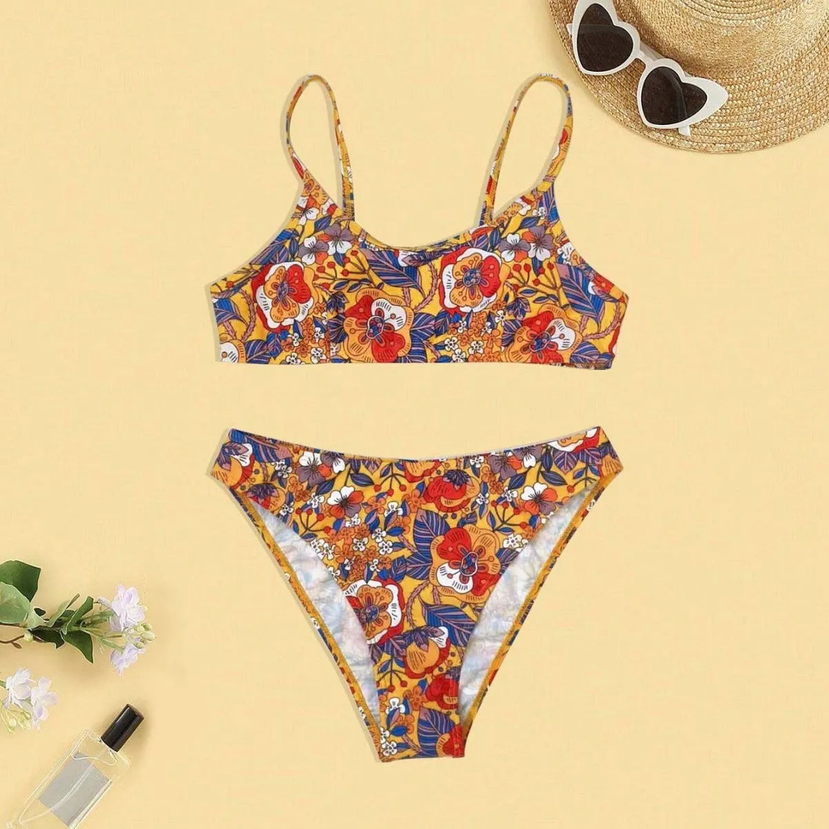 Plus size floral print women's bikini swimsuit with adjustable straps.