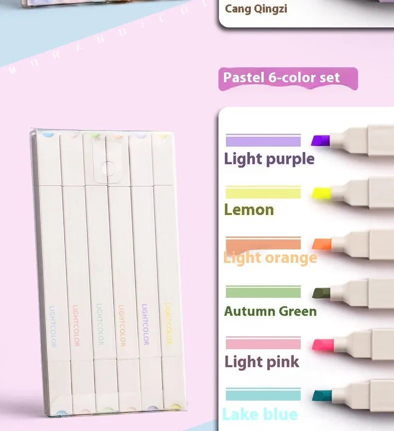 Set of double-headed fluorescent marking pens in bright colours on a white background.