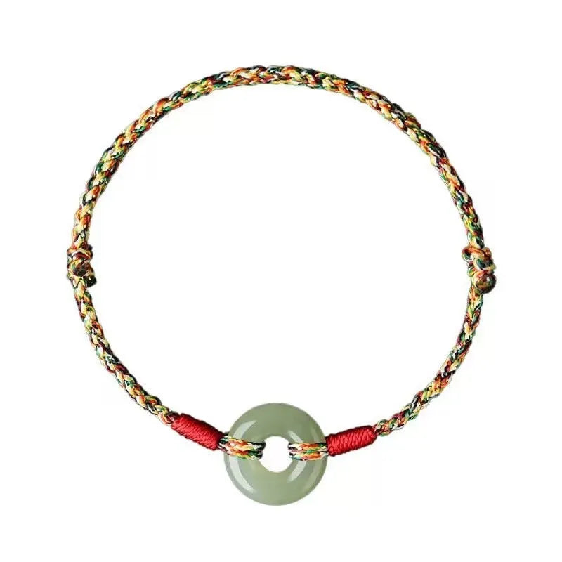 Colourful braided rope bracelet with peace buckle fastening in woven unisex design
