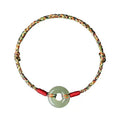 Colourful braided rope bracelet with peace buckle fastening in woven unisex design