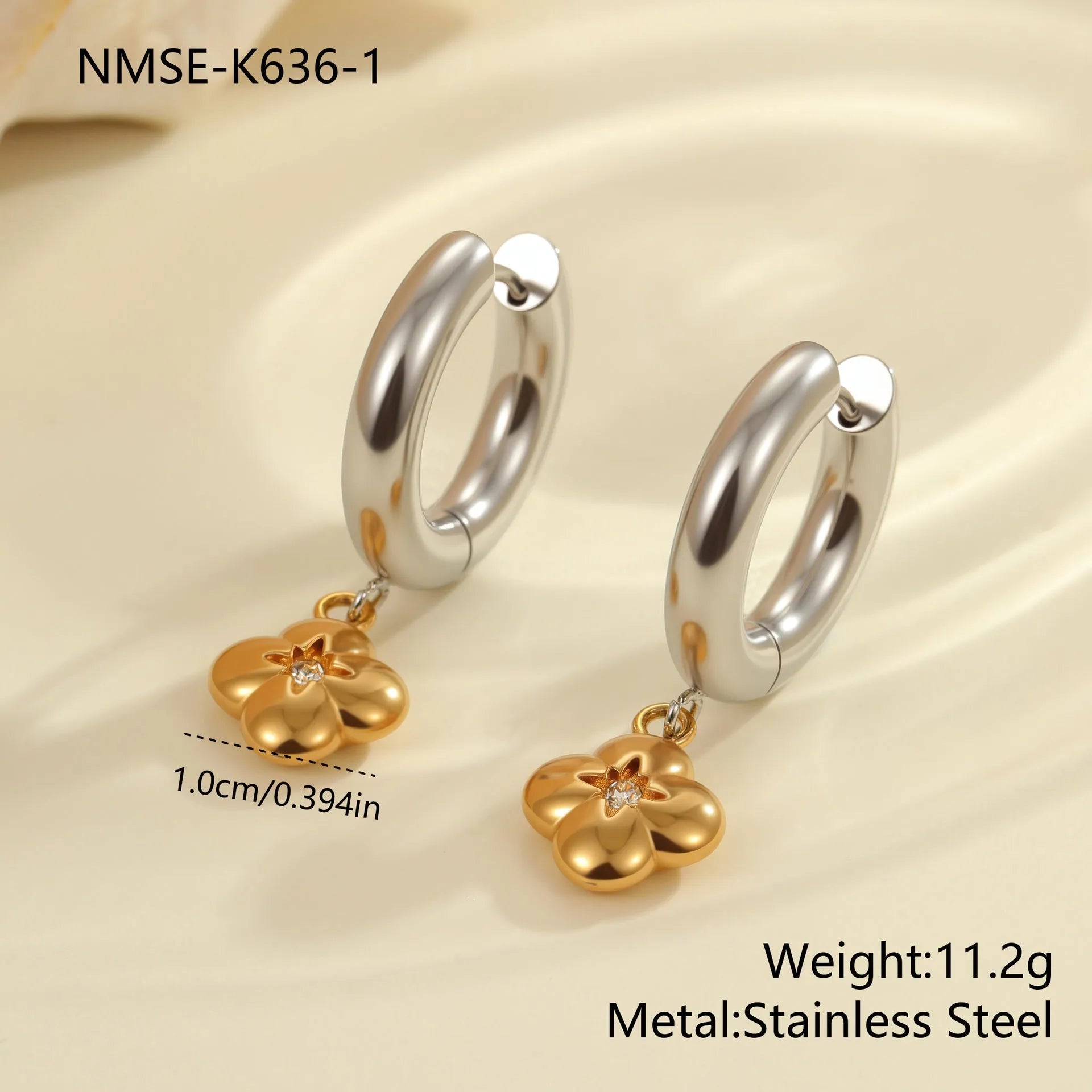 Women's stainless steel earrings with 18K gold plating in heart, star, and Christmas tree shapes.