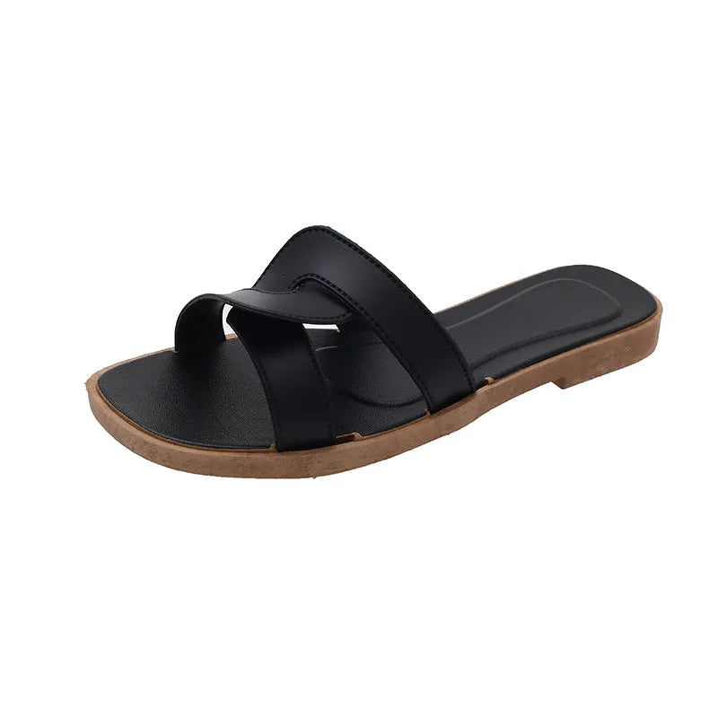 Women's PVC cross strap sandals in light blue colour showing non-slip sole and toe ring design
